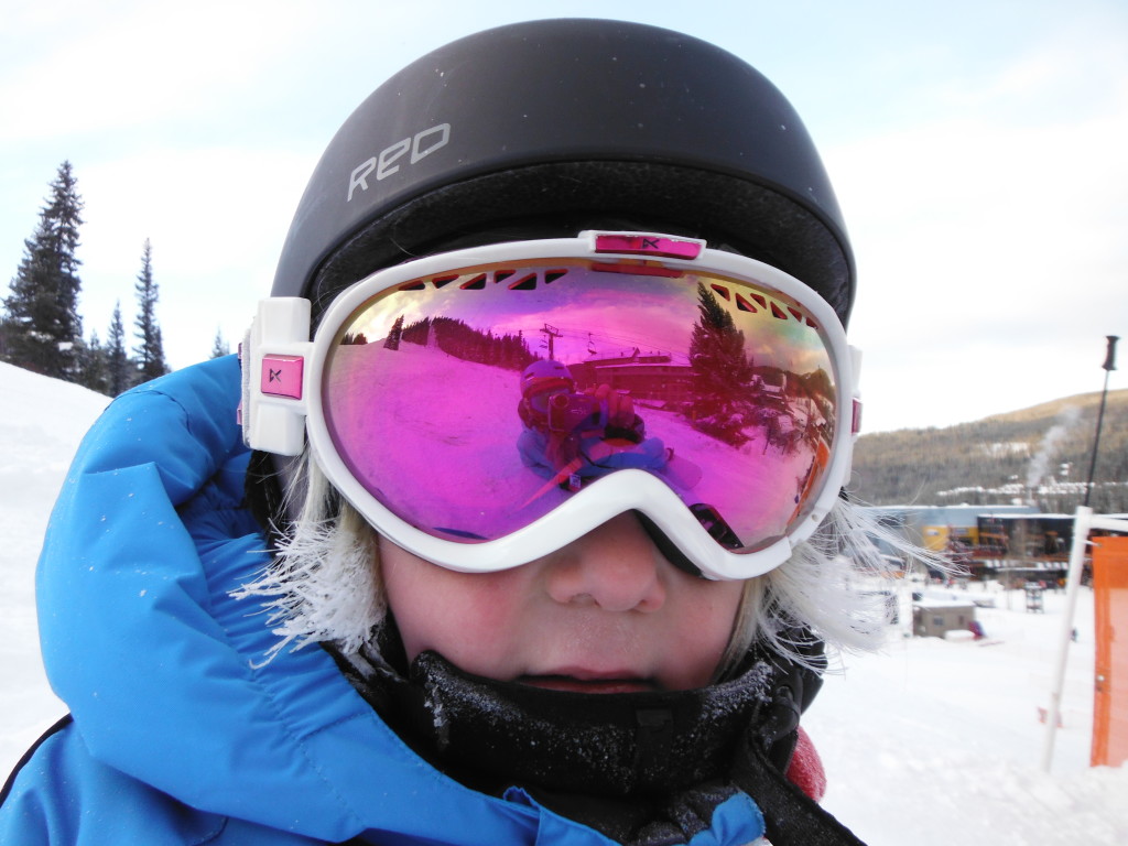 Wesley rocking my hot pink goggles.  His hair looked blonder than usual, until I realized it was covered in snow icicles.  